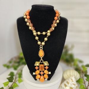 Long Orange and Gold Bead Necklace with Geometric Pendant
